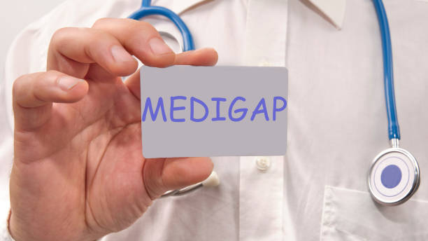 medigap written on the doctor's card. Medical concept.