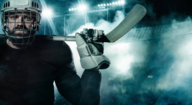 Hockey player in the mask on stadium.